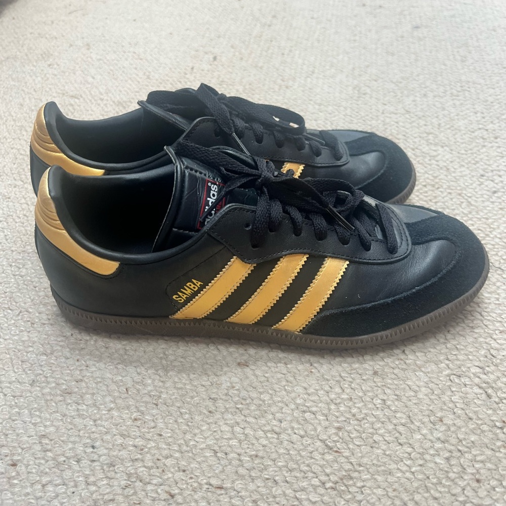 Adidas Black and Gold Sneakers with Iconic Style
